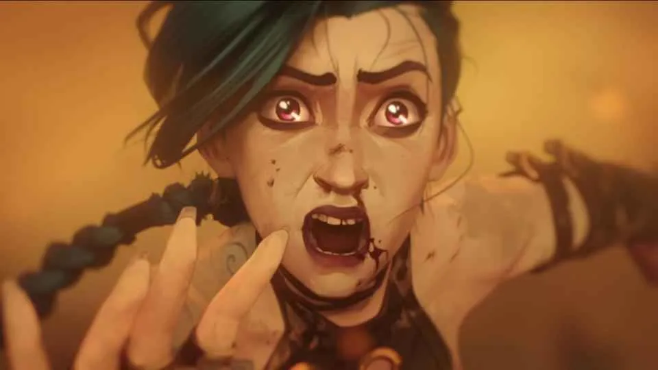 jinx looking real beat up and sad reaching towards the camera