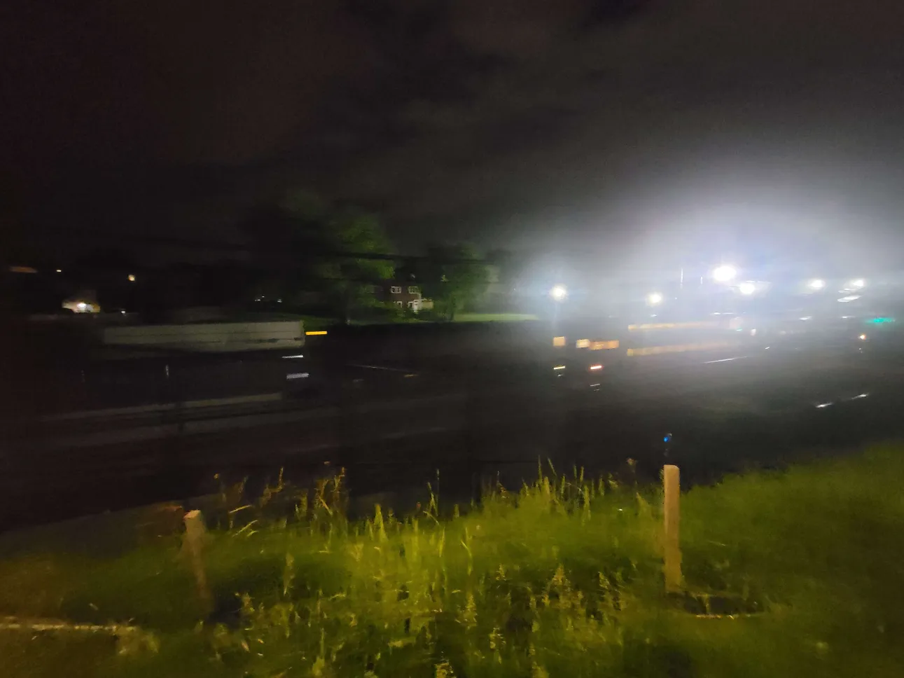 blurry photo of the lowell line at night